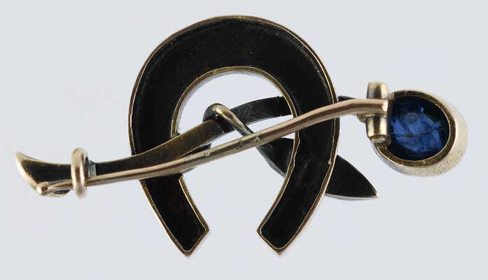 Брошь из желтого металла, общим весом 4,89 грамма